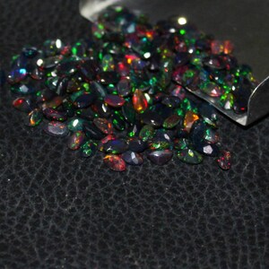 Black opal gemstone, natural black opal, black oval opal cut, Ethiopian black faceted oval opal, multi fire black opal faceted cut 3x5 mm