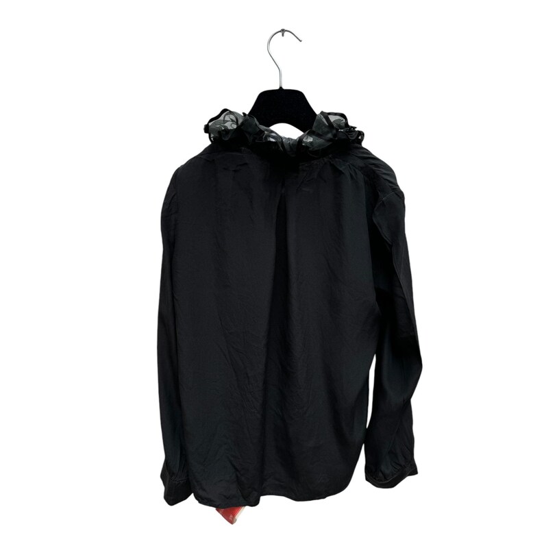 May include: A black long-sleeved blouse with a ruffled collar made of sheer black fabric.
