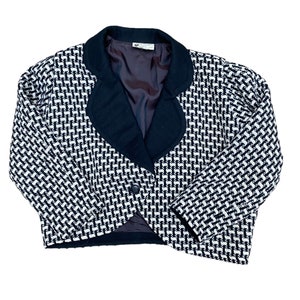 May include: A black and white patterned blazer with a black collar and a single button closure.