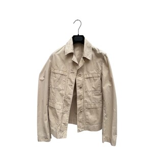 May include: A beige utility jacket with multiple pockets and a button closure.
