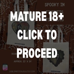 May include: Two white tote bags with black and yellow heart-shaped graphics featuring a Scream mask. The text "MATURE 18+" and "CLICK TO PROCEED" are overlaid on the image. The bag size is approximately 13" x 14".