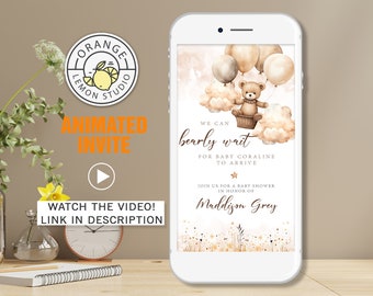 May include: A smartphone displays a baby shower invitation with a teddy bear, balloons, and clouds. The text reads "We can bearly wait for Baby Coraline to arrive." The invitation is designed by Orange Lemon Studio.