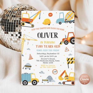 May include: A rectangular birthday invitation card featuring construction vehicles, a yellow hard hat, and traffic signs. The text reads: STOP THE TRAFFIC AND CLOSE THE ROAD, OLIVER IS TURNING TWO YEARS OLD, COME JOIN THE CREW, Saturday, September 23.