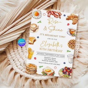 May include: A rectangular birthday invitation card featuring watercolour illustrations of breakfast foods including eggs, bacon, a croissant, waffles, pancakes, and coffee. The text reads Rise & Shine, It's Breakfast Time, Join Us For Elizabeth's 10th Birthday.