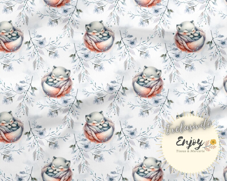 May include: A seamless pattern featuring watercolor illustrations of foxes curled up in nests, surrounded by delicate blue and gray floral branches on a white background. The text "Exclusive Enjoy Tissus & Mercerie" is in the lower right corner.