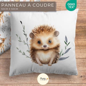May include: A white pillowcase featuring a watercolour illustration of a hedgehog with brown fur and a light brown nose. The hedgehog is surrounded by green and blue leaves. The pillowcase is 50 cm x 50 cm and has the text "PANNEAU &Agrave; COUDRE" and "Oeko Tex&reg;" printed on it.