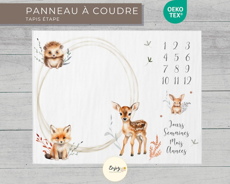 May include: A white growth chart with a brown wooden frame. The chart features a circle with a white background and a brown border. The circle is surrounded by illustrations of a hedgehog, a fox, a deer, and a rabbit. The chart also includes numbers 1 through 12 and the words "Days, Weeks, Months, Years".