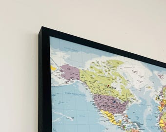 Black Framed Push Pin Travel Map - World Map - Light Blue Background - Solid Wood Frame - Made in the UK