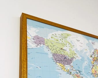 Oak Finish Framed Push Pin Travel Map - World Map - Light Blue Background - Solid Wood Frame - Made in the UK