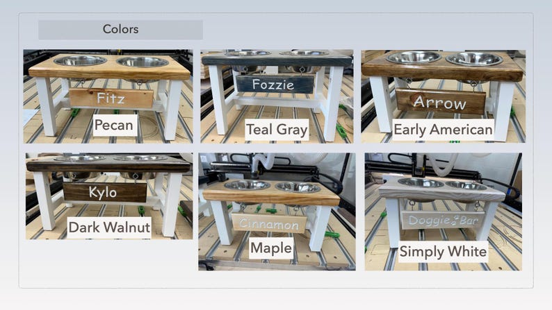 May include: A set of six double dog bowls with a variety of wood finishes and colors. The bowls are elevated on white legs and have a personalized nameplate. The wood finishes include pecan, teal gray, early American, dark walnut, maple, and simply white.