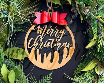 Artisan Metal Christmas Bauble: Rustic Holiday Ornament with Red Ribbon