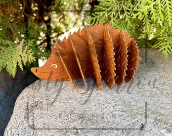 Rusted Metal Hedgehog Sculpture: Whimsical Garden Decor