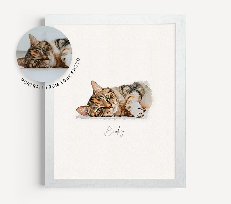 May include: A watercolor painting of a tabby cat lying on its side with its paws curled up. The cat has green eyes and a brown and black striped coat. The painting is on a white background with the name "Bucky" written below the cat.