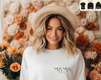 May include: White sweatshirt with black text that reads "MAMA" with a triangle design above and below the word. The text "Rock & Love" is written below the word "MAMA".