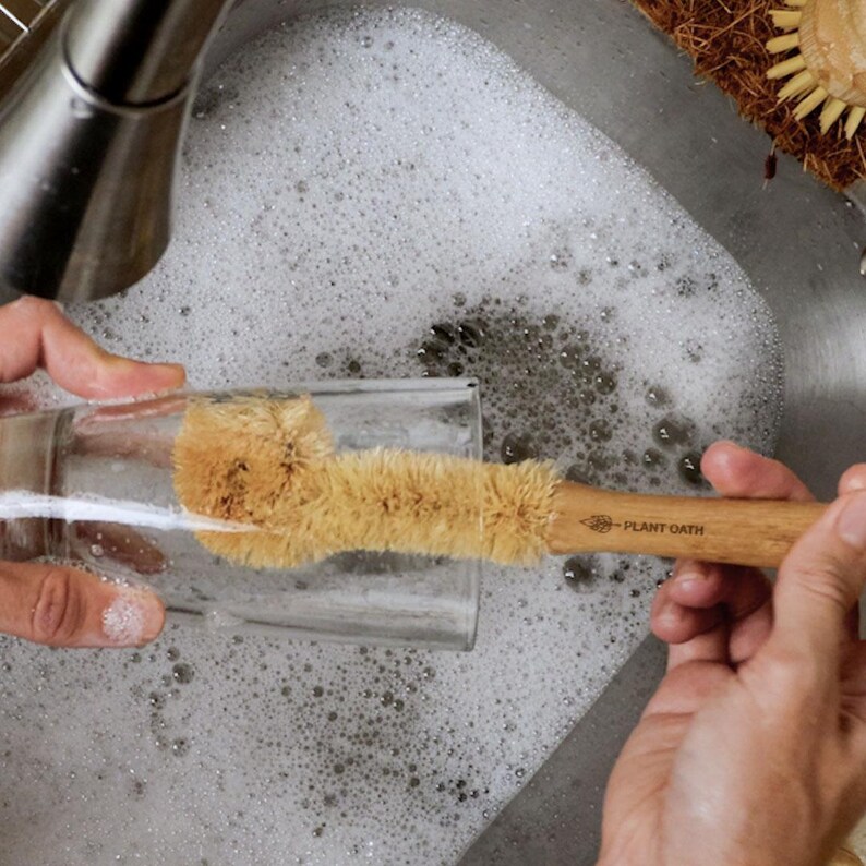 Our versatile Bamboo Brush features an attachable head for effortless cleaning tasks. Crafted from sustainable bamboo, this eco-friendly cleaning tool offers both functionality and sustainability. With its detachable head feature, you can easily switch between different brush heads for various cleaning tasks, from dishes to countertops. The durable bamboo handle provides a comfortable grip, while the sturdy bristles ensure effective cleaning without scratching surfaces.