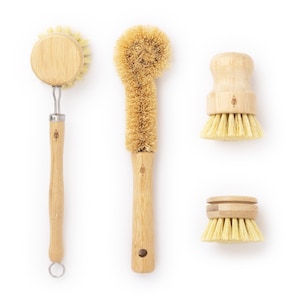 May include: Four natural bristle brushes with wooden handles. The brushes are designed for cleaning dishes and other household items.