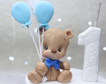 Boy bear in fondant or cold porcelain with blue bow tie with white and blue balloons and candle - gift for boy topper for cake decoration