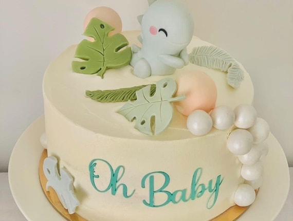 Figura de dinosaurio bebé con hojas en fondant o porcelana - Etsy México Figura de dinosaurio bebé con hojas en fondant o porcelana - Etsy México