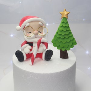 Santa Claus fondant topper for Christmas cake in sugarpaste or cold porcelain