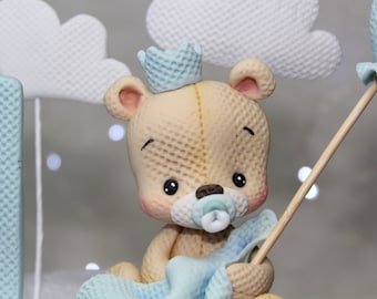 Teddy bear cake topper Teddy bear with birthday hat cake decorations for birthday.Amigurumi texture.