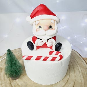 Santa Claus fondant topper for Christmas cake in sugarpaste or cold porcelain
