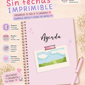 May include: A light pink spiral-bound planner with the word Agenda printed in black script. The cover features a rectangular illustration of a blue sky with clouds over a green landscape. A light pink pen rests beside the planner on the right side.