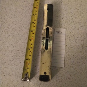 very old spirit/bubble level in excellent restored condition.  Uncommon design. Very accurate and ready for use.