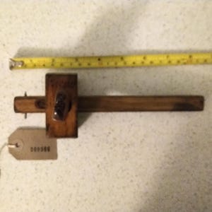 Marples marking gauge. A bit tatty but still in working condition.