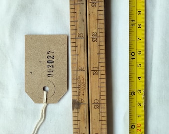 Early Raybone 2 foot folding boxwood ruler in good condition albeit with some wear. [002027]