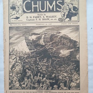 Puede incluir: Portada de la revista vintage "CHUMS" del 24 de febrero de 1917, con una ilustración en blanco y negro de un tanque etiquetado como "HOT STUFF" en una escena de guerra. La portada incluye texto e ilustraciones, con un precio de un penique.