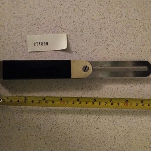 Vintage brass and rosewood carpenters sliding bevel gauge in exceptional condition. Fully restored and ready for use.