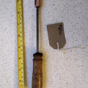 very small copper ended traditional soldering iron cleaned and ready for use.