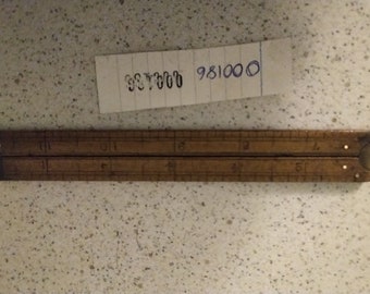very unusual 12 inch folding carpenters ruler in box wood and brass and in  lovely useable condition