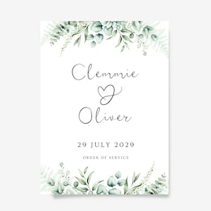 May include: A wedding order of service featuring a green and white floral design. The names Clemmi and Oliver are written in cursive with a heart symbol between them. The date 29 July 2029 and the words "Order of Service" are printed below.