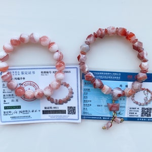 May include: Two red and white agate bracelets with authenticity certificates. The certificates include details like the material, weight, and color of the bracelets.