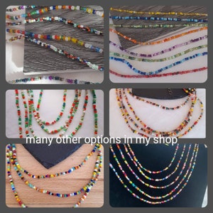 May include: A collection of colorful beaded necklaces, some with multiple strands, in various colors and patterns. The necklaces are displayed on a dark background. "many other options in my shop" is written in white text below the necklaces.