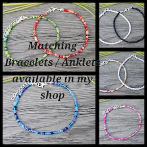 May include: A collection of beaded bracelets and anklets in various colors, including green, red, black, white, blue, and pink. The image includes text that reads "Matching Bracelets / Anklets available in my shop."