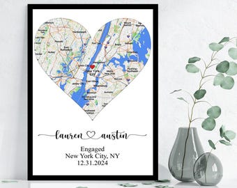 May include: A black and white map of New York City in the shape of a heart with a red pin marking the location of New York City. The text "lauren austin" is written in cursive above the map. Below the map, the text "Engaged" is written in all caps, followed by "New York City, NY" and "12.31.2024".