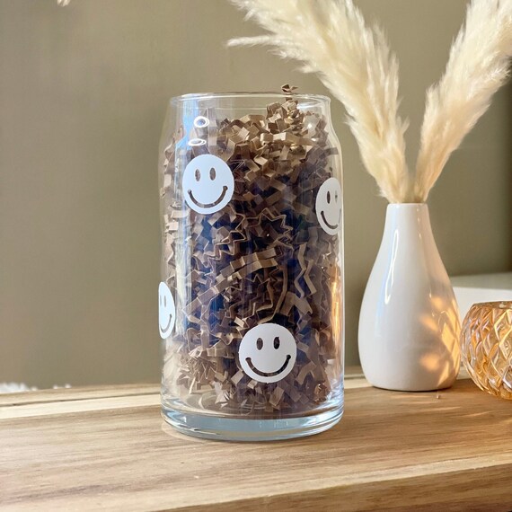 Smiley face glass can