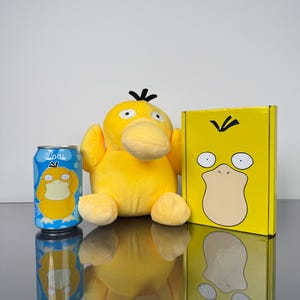 Pokémon TCG-doos met Psyduck-thema – inclusief boosterpacks (Engels en Japans), pluche, frisdrank en meer!