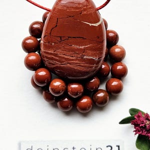 Red Jasper gemstone pendant as a necklace with matching pearl bracelet made of red jasper beads
