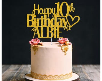 Personalized glitter cake topper for a 10th birthday, customizable with name and age