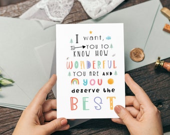May include: A white card with colorful text that reads "I want, you to know how wonderful you are and you deserve the best". The card has a star, arrow, cloud, trees, rainbow, and sun illustrations.