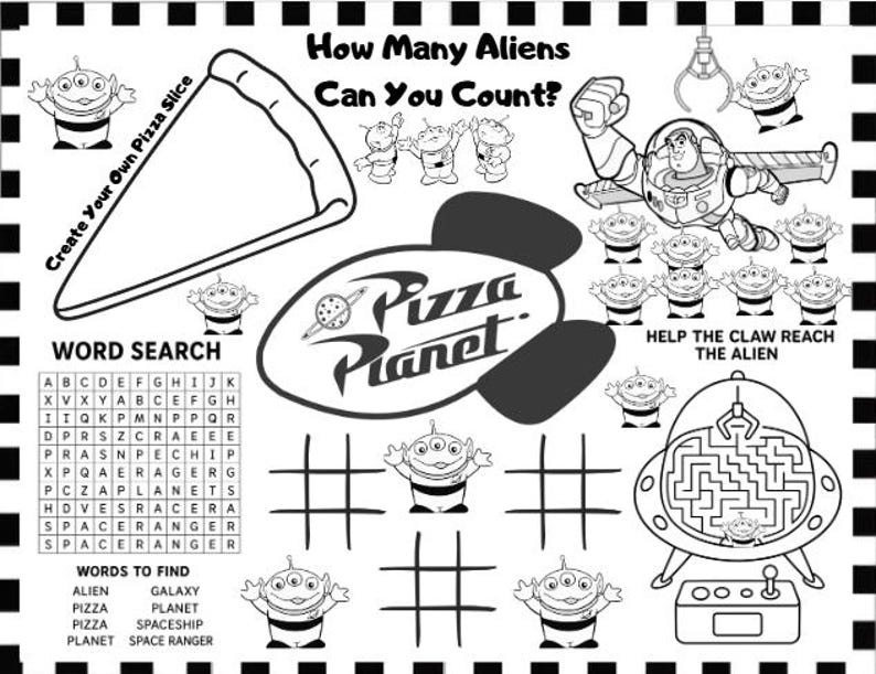 May include: Black and white activity sheet featuring a Pizza Planet theme. Includes a word search, tic-tac-toe, a maze, and a drawing of Buzz Lightyear. Text includes "How Many Aliens Can You Count?" and "Help the Claw Reach the Alien."