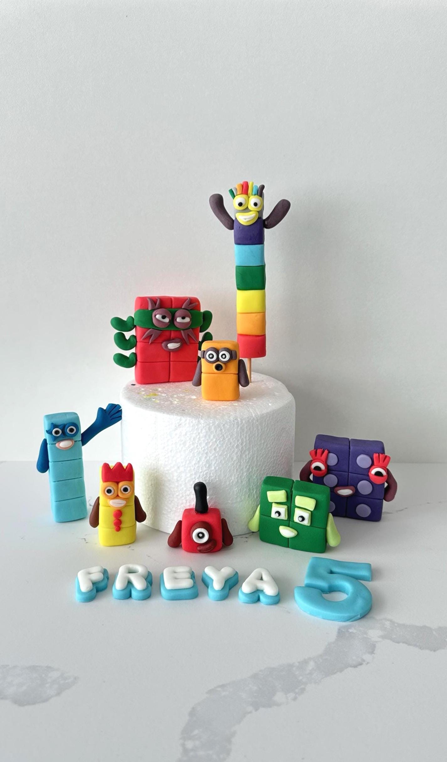 complete set of 5 or 8 EDIBLE NUMBER BLOCKS cake toppers with name and age.