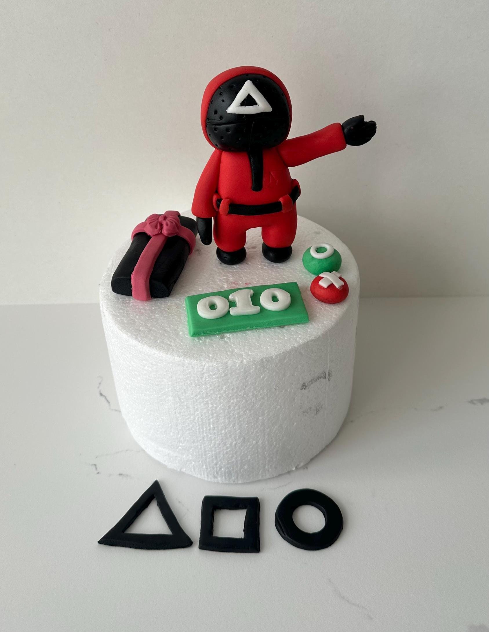 EDIBLE Handmade Squid game themed cake topper.