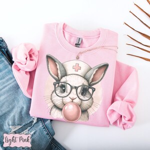Nurse Rabbit Sweatshirt, Cute Bunny Rabbit Sweatshirt, Easter Bunny Nurse Sweatshirt, Gift For Nurse, Registered Nurse Sweatshirt, ER Nurse