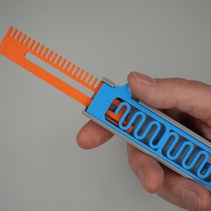 Cuchillo/peine Fidget OTF