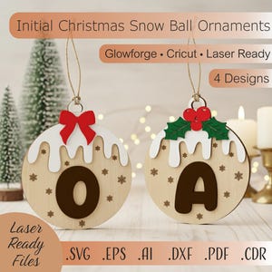 May include: Wooden Christmas ornaments with the letters "O" and "A". Each ornament has a white icing design, snowflakes, and a red bow or holly berries. The text "Initial Christmas Snow Ball Ornaments" is at the top.