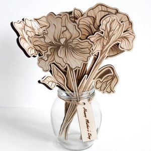 May include: A bouquet of laser-cut wooden flowers in a clear glass vase with a tag that reads "Happy Mother's Day".